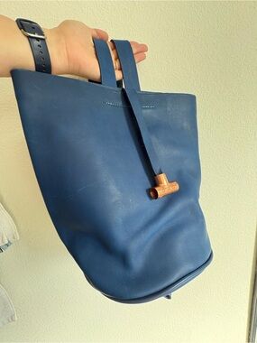 Structured Navy Leather Tote Backpack with Copper Accent
